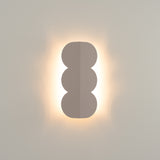 Wellen-Wandleuchte BISCUIT – Skulpturaler Aluminium-Spot in 10 Trendfarben