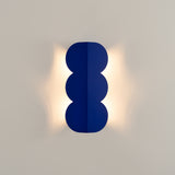 Wellen-Wandleuchte BISCUIT – Skulpturaler Aluminium-Spot in 10 Trendfarben